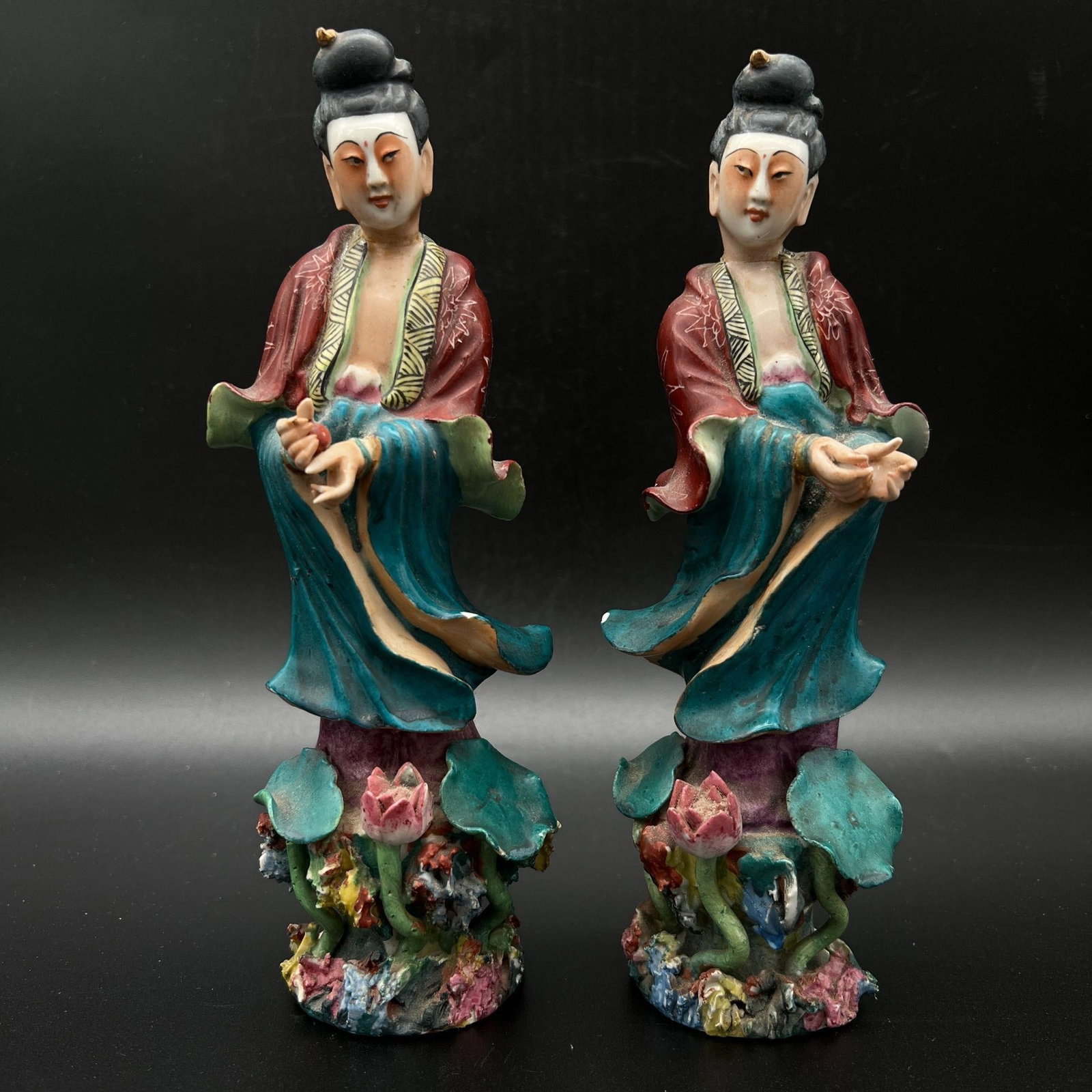 Pair Of Chinese Buddhist Bodhisattva Figurines: Pair Of Chinese Buddhist Bodhisattva Figurines. Illegibly signed on the rear of the base. Dimensions (in): 8.5 x 3 x 2.25. Both figures have multiple small chips.