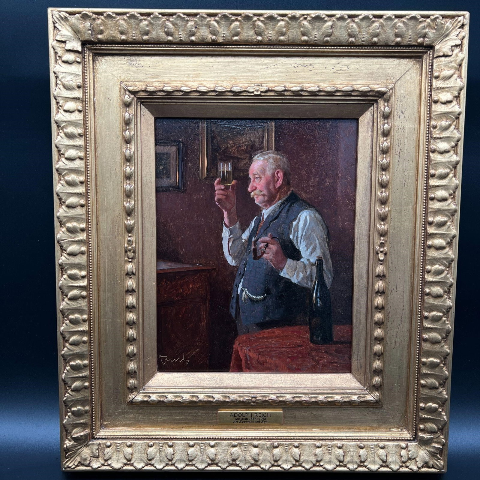Adolph Reich (Austrian, 1887-1963) Oil Painting: Adolph Reich (Austrian, 1887-1963) Oil Painting. Oil painting on board. Adolph Reich (1887-1963). Titled 'An Experienced Eye.' Painting depicts an older gentleman, a wine connoisseur, holding a smokin