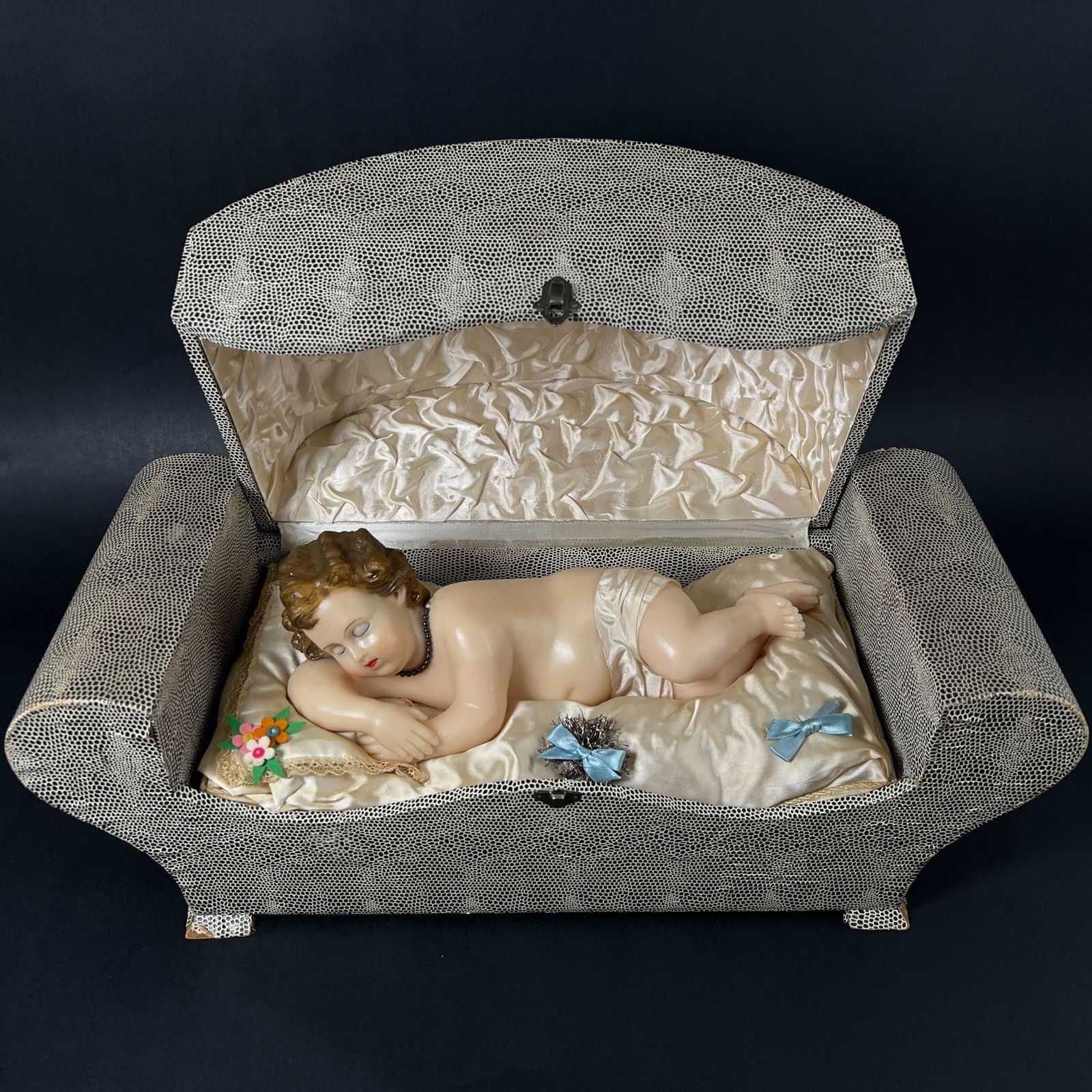 Wax Baby Jesus Automaton Music Box: Wax Baby Jesus Automaton Music Box. Tested and in working condition, eyes open and close. Approx. Dimensions (in): 8.75 x 7.5 x 19.25.