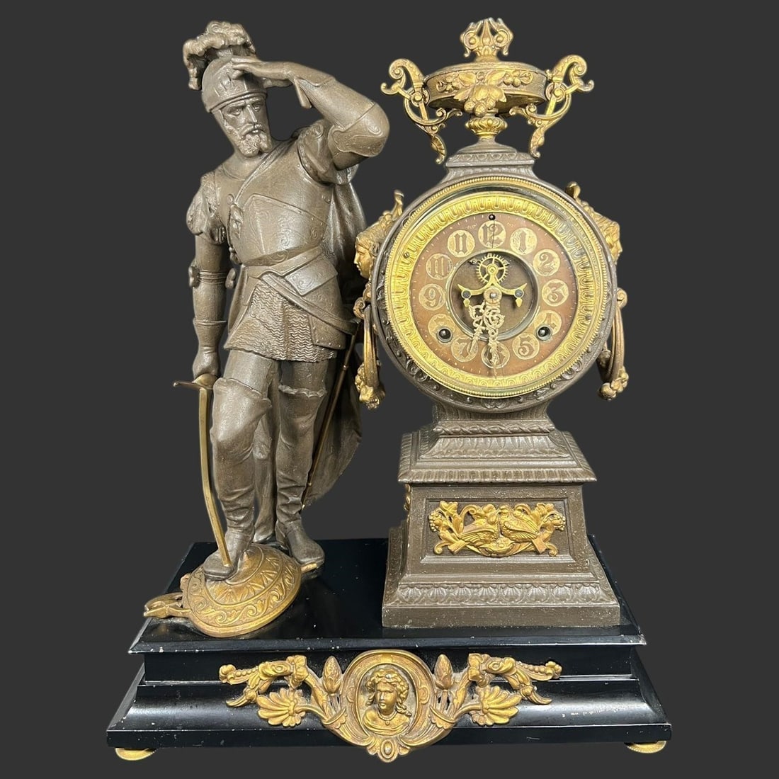 Antique Ansonia Spelter Figural Soldier Clock: Antique Ansonia Spelter Figural Soldier Clock. Marked on the back movement. Approx. Dimensions (in): 20 x 6.75 x 15. Part of the finial appears to be broken off.