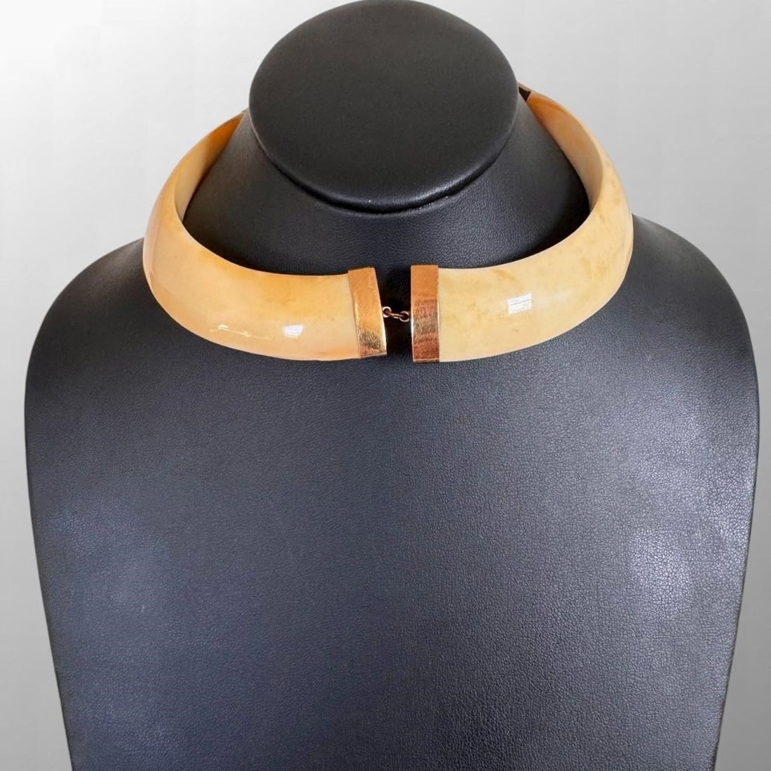 18K Yellow Gold & Boar's Tooth Choker Necklace: 18K Yellow Gold & Boar's Tooth Choker Necklace . Wide boar's teeth and 18 karat yellow gold choker worn by Mary Martin. Hallmarks: 18K PT. Includes photograph of Actress Mary Martin wearing the neckla