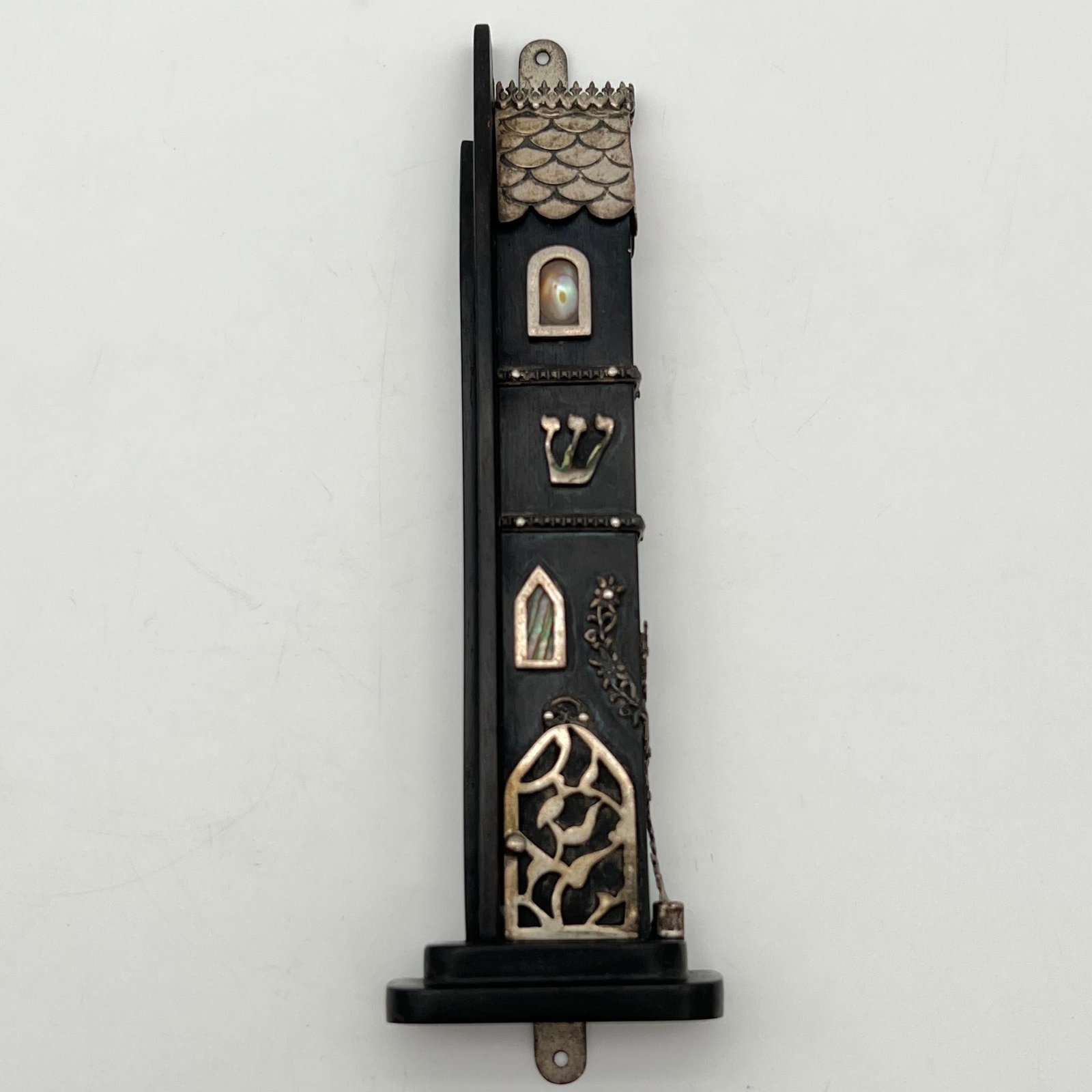 Judaica Jewish Mezuzah Wood Sterling Silver House: Judaica Jewish Mezuzah Wood Sterling Silver House. Shin.' Illegibly signed in Hebrew on the back. Approximate dimensions (in): 6.25 x 2 x 0.75. Buyer pays shipping cost. We provide in-house shipping f