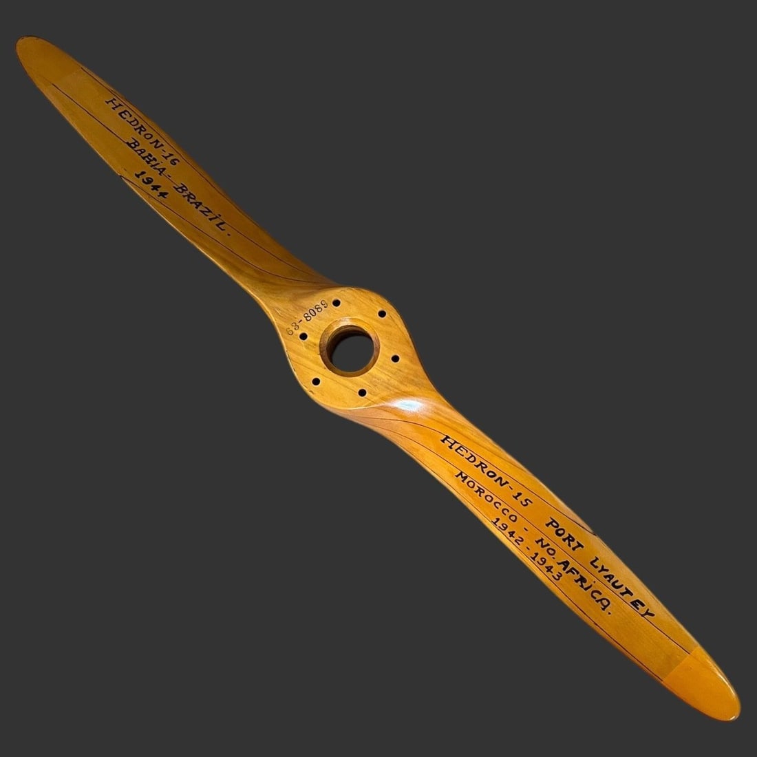 WW2 World War 2 Wooden Airplane Propeller: WW2 World War 2 Wooden Airplane Propeller. Writing on propeller states: Hedron-16 Bahia Brazil 1944. Hedron-15 Port Lyautey Morocco - No. Africa. 1942-1943. Approximate Length (in): 43.25. Marked: 680