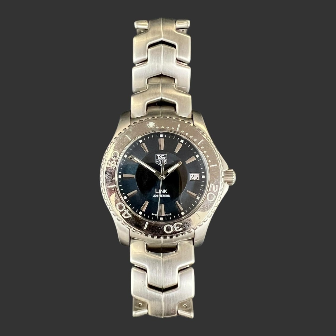 Tag Heuer Link 200 Meters Swiss Men's Wristwatch: Tag Heuer Link 200 Meters Swiss Men's Wristwatch . 3083. Black dial. Approximate watch size: 38mm.. Buyer pays shipping cost. We provide in-house shipping for some of the items. Our shipping quote is 