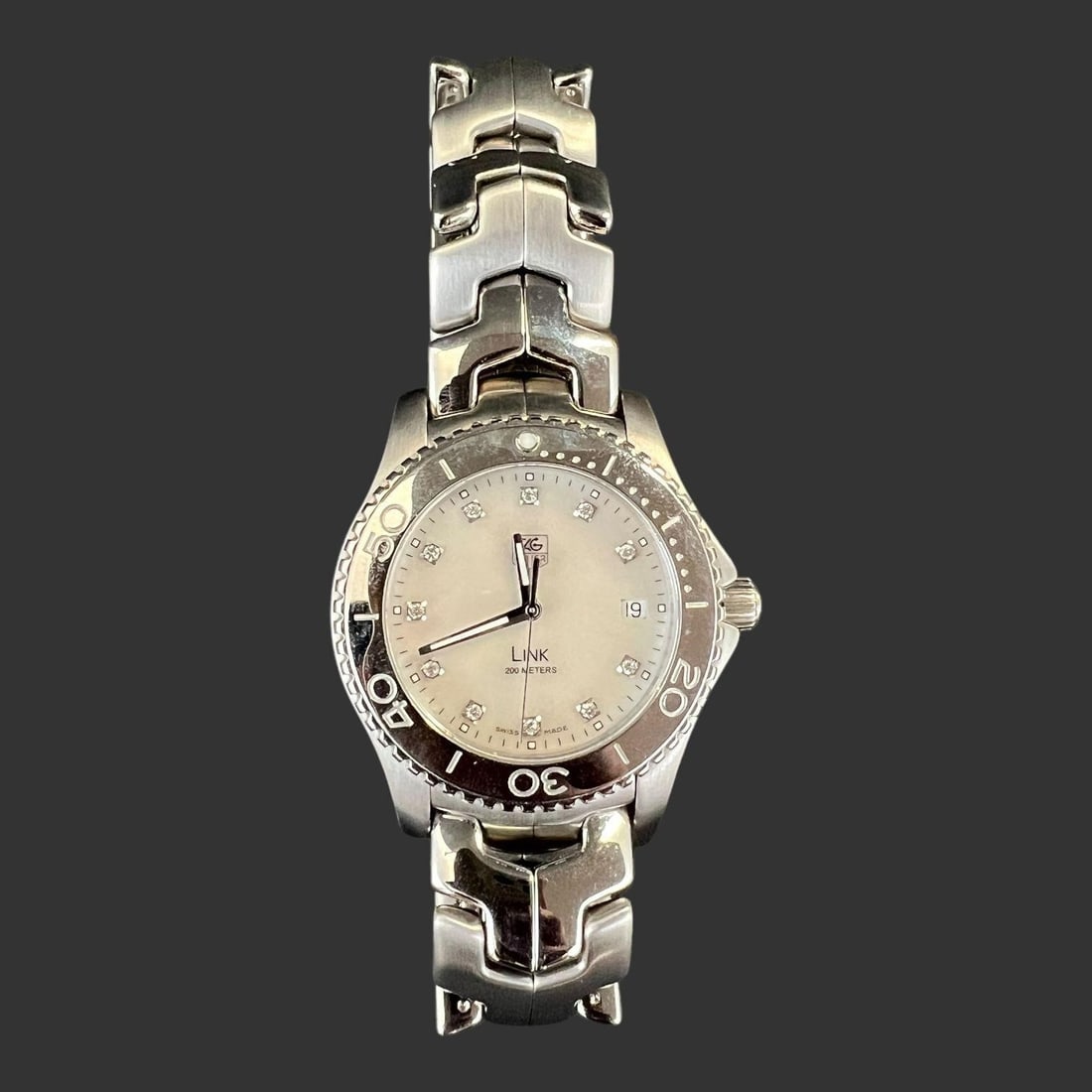 Tag Heuer Link 200 Meters Swiss Men's Wristwatch: Tag Heuer Link 200 Meters Swiss Men's Wristwatch. Approximate watch size: 39mm.. Buyer pays shipping cost. We provide in-house shipping for some of the items. Our shipping quote is only good for shipp