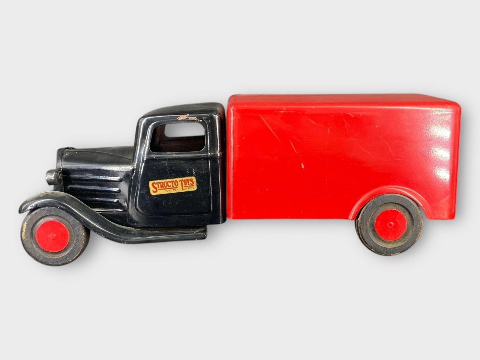 Structo Toys Make Men of Boys Toy Truck: Structo Toys Make Men of Boys Toy Truck . Pressed steel. Red, black. Approx. Size (in): 18.5