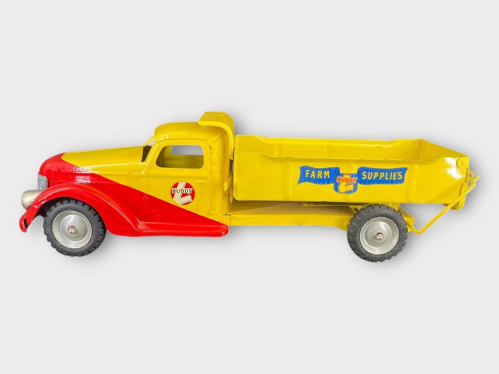 Buddy L Farm Market Delivery Supply Truck: Buddy L Farm Market Delivery Supply Truck . Yellow, red. Approx. Dimensions (in): 21 x 6.75 x 6