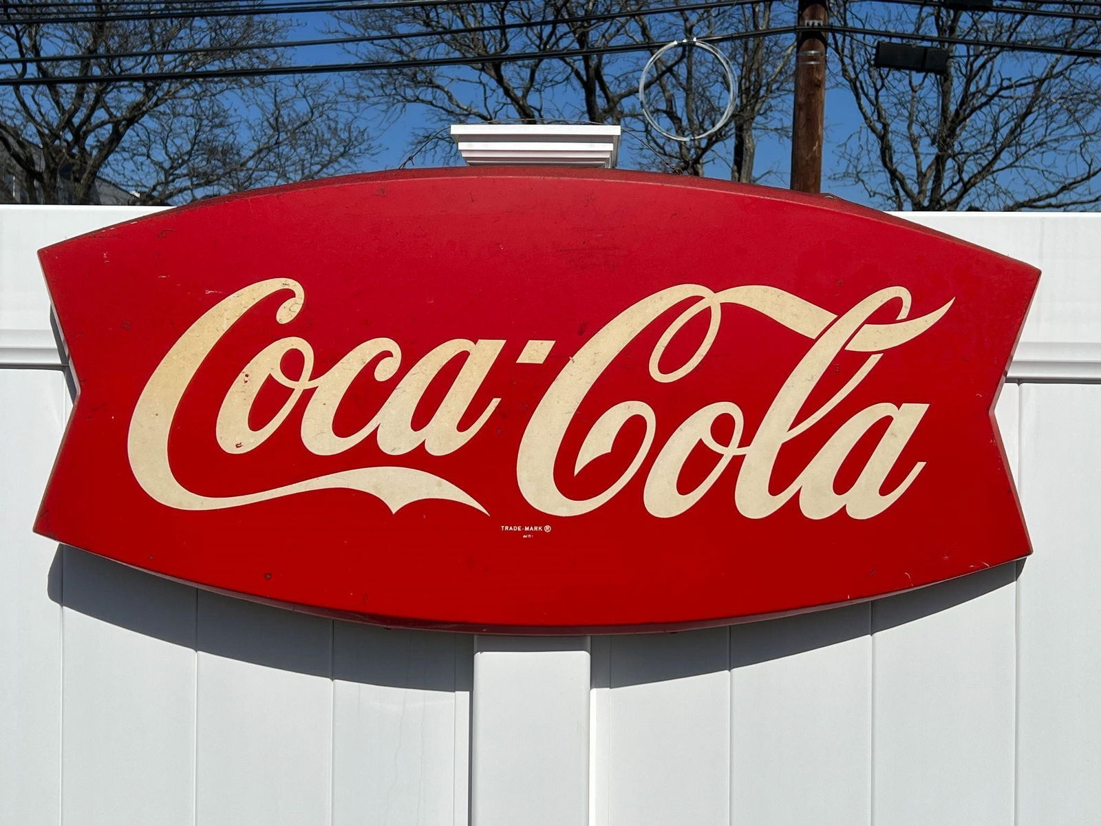 Coca-Cola Fishtail Metal Soda Advertising Sign: Coca-Cola Fishtail Metal Soda Advertising Sign . Approx. Dimensions (in): 19.75 x 42 x 1.25