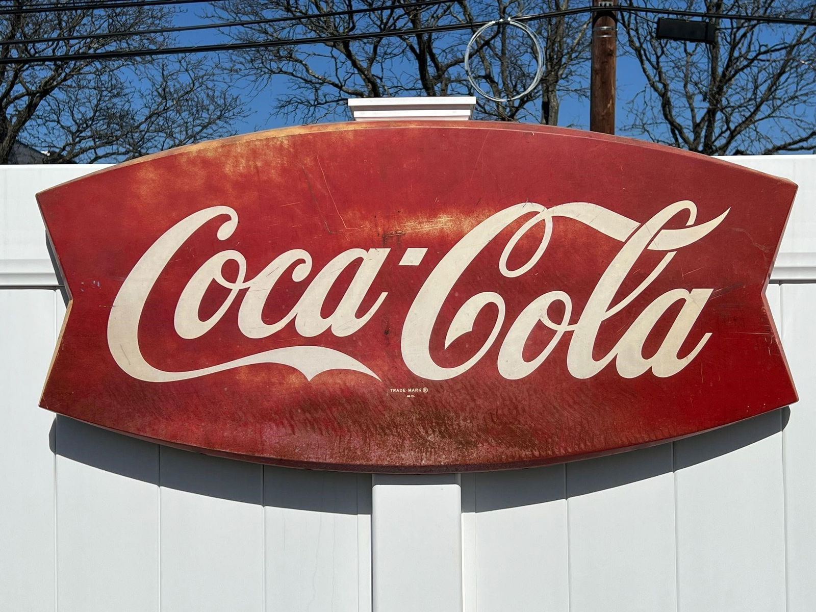 Coca-Cola Logo Fishtail Soda Advertising Sign: Coca-Cola Logo Fishtail Soda Advertising Sign . Approx. Dimensions (in): 19.75 x 42 x 1.25