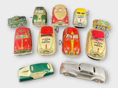 Marx Mechanical Wind-Up Hubley Toy Cars, Lot of 11: Marx Mechanical Wind-Up Hubley Toy Cars, Lot of 11. Safe Driving School, Fire Chief car, War Tank Trucks. Approx. Dimensions (in): 1.5 x 3, 3 x 6.5