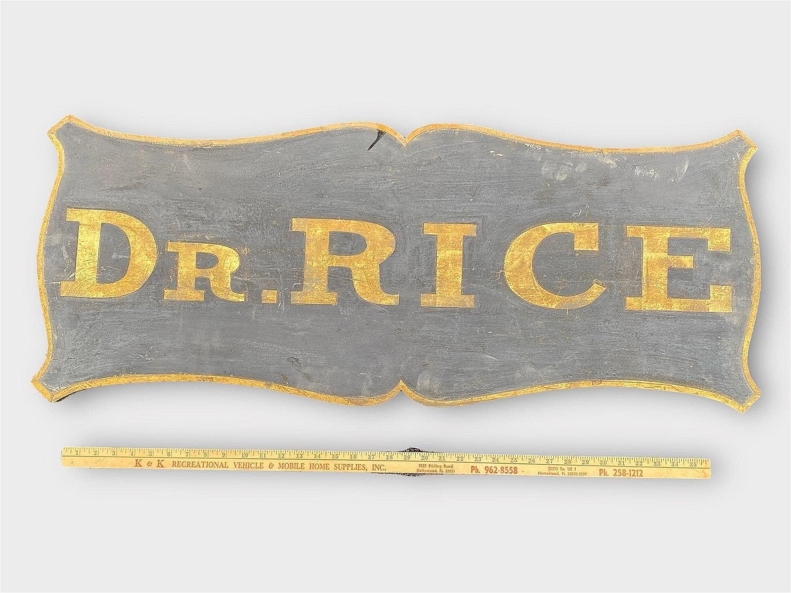 Vintage Dr. Rice Carved Wood Ornate Sign 40": Vintage Dr. Rice Carved Wood Ornate Sign 40". Approx. Size: 40" x 16"