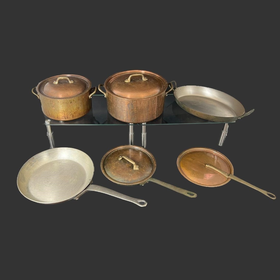 Lot of 6 Copper Paderno French Pots & Pens: Pieces are marked 'Paderno. Made in France.' Approx. Biggest Piece Size (in): 6.25 x 12 (width with handle) x 9.5.