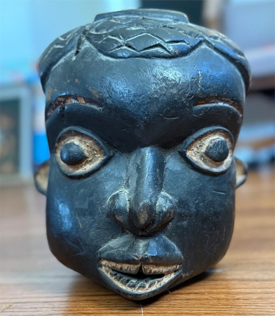 Carved Wooden African Bamoun Face Mask: This mask is most likely from the Ivory Coast of Africa. Approx. Dimensions (in): 11 x 9.5 x 9.25.