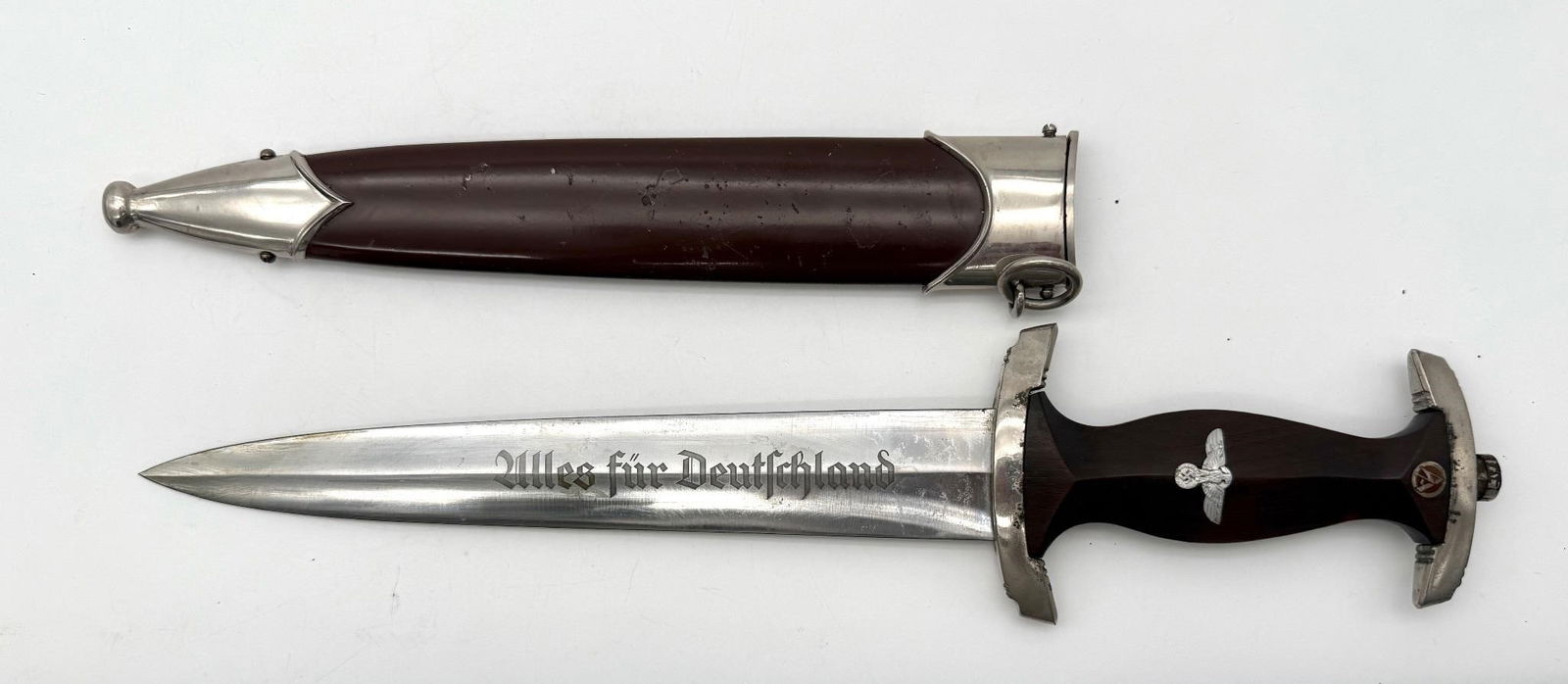 RZM M7/80 SA Nazi Dagger W/ Scabbard: German dagger. Marked RZM M7/80 on the blade. SA-Dienstdolch dagger with the inscription Alles für Deutschland on the blade. There are some marks to the scabbard. Approx. Dimensions (in): 14.75 x 3.