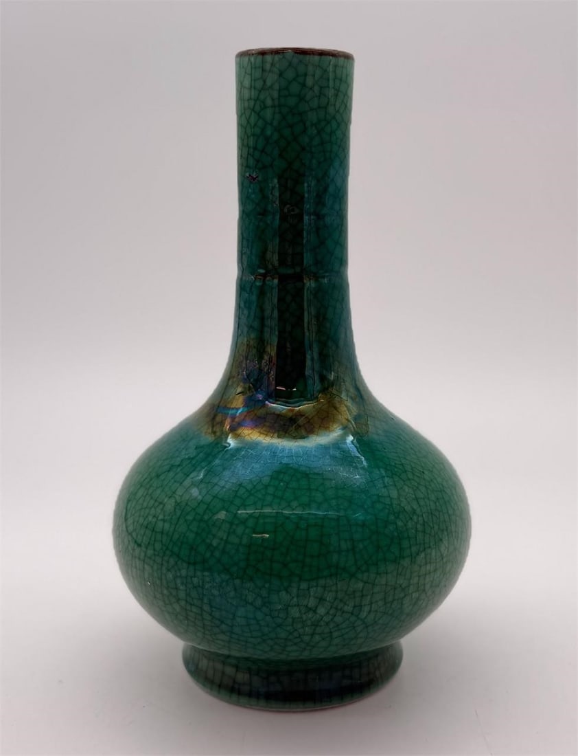 Asian Iridescent Green Crackle Porcelain Vase: Iridescent green crackle finish. This piece is unsigned. Approx. Dimensions (in): 8.25 x 4.5.