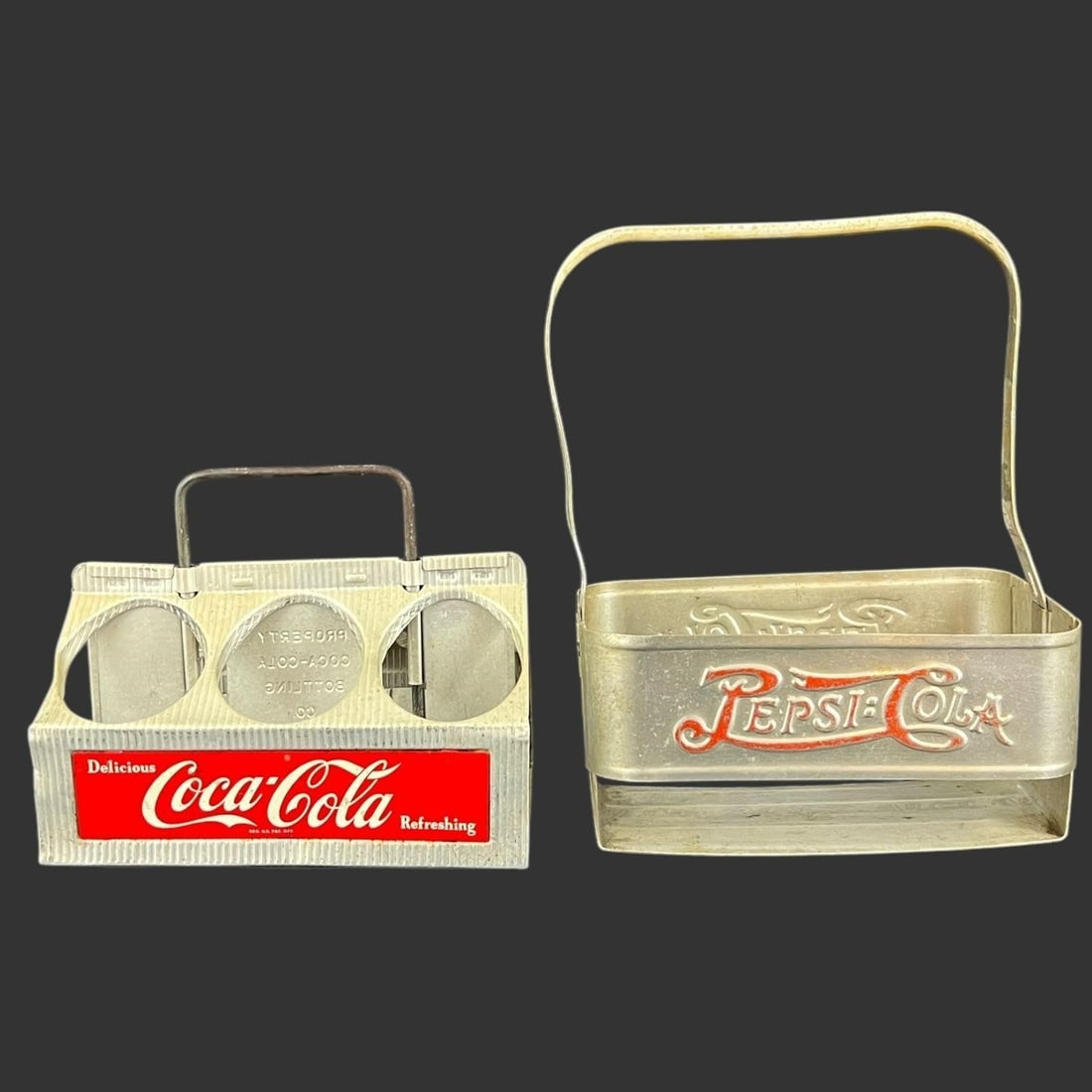 Lot of 2 Coca-Cola and Pepsi-Cola Bottle Holders: Vintage glass bottle holders. Approx. Pepsi-Cola Dimensions (in): 11 x 8.25 x 5.25.