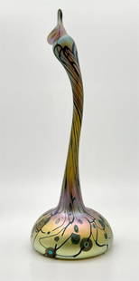 Iridescent Art Glass Vase Signed Louis Comfort Tiffany Favrile: Signed on the bottom: L.C.T-Favrile T3201C. Iridescent glass finish. Goose neck design with peacock wing pattern. Approx. Dimensions (in): 15.25 x 5.