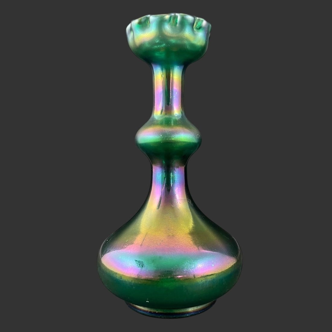 Loetz-Style Iridescent Bohemian Glass Vase: Loetz-Style Iridescent Bohemian Glass Vase. Iridescent finish. Unsigned. Approx. Dimensions (in): 8.75 x 4.5 x 4.5. Buyer pays shipping cost. We provide in-house shipping for most of the items. Our sh