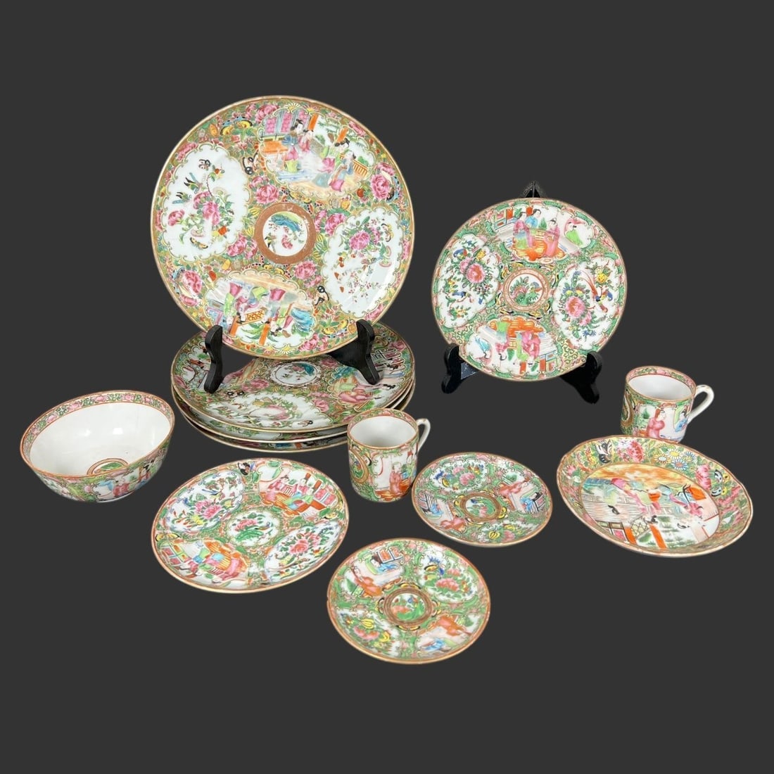 Lot of 12 Chinese Porcelain Family Rose Pieces: Lot of 12 Chinese Porcelain Family Rose Pieces. One cup has been reglued, Bowl has one hairline, 2 small saucer has chips on edge, one plate has chip on the edge, 2 big plates have old repairs. Approx
