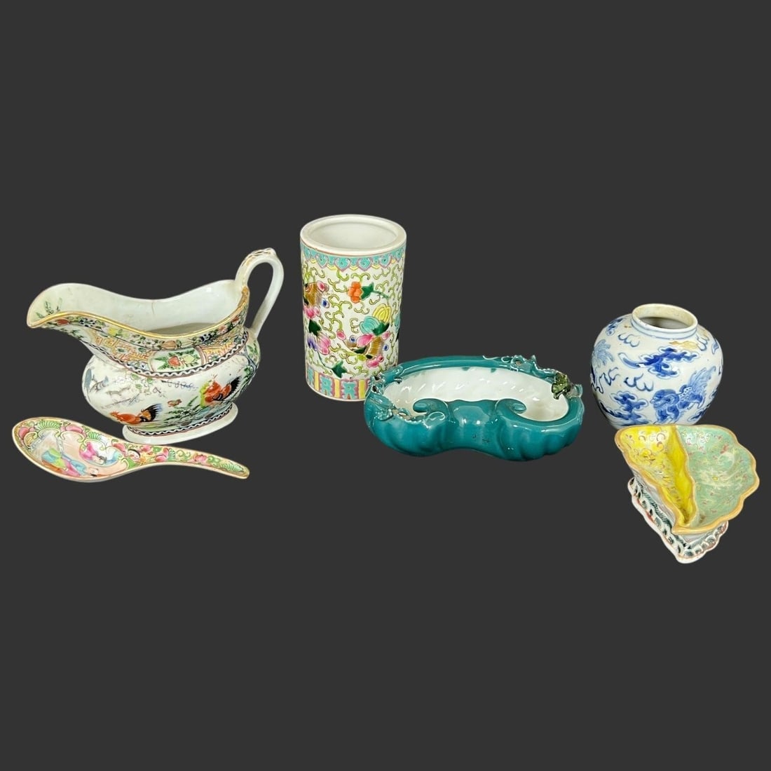 Lot of 6 Miscellaneous Chinese Porcelain Pieces: Lot of 6 Miscellaneous Chinese Porcelain Pieces. Creamer has one small hairline crack. 3/6 pieces are signed on the bottoms. Approx. Vase Size (in): 5 x 3.25 x 3.25. Buyer pays shipping cost. We provi