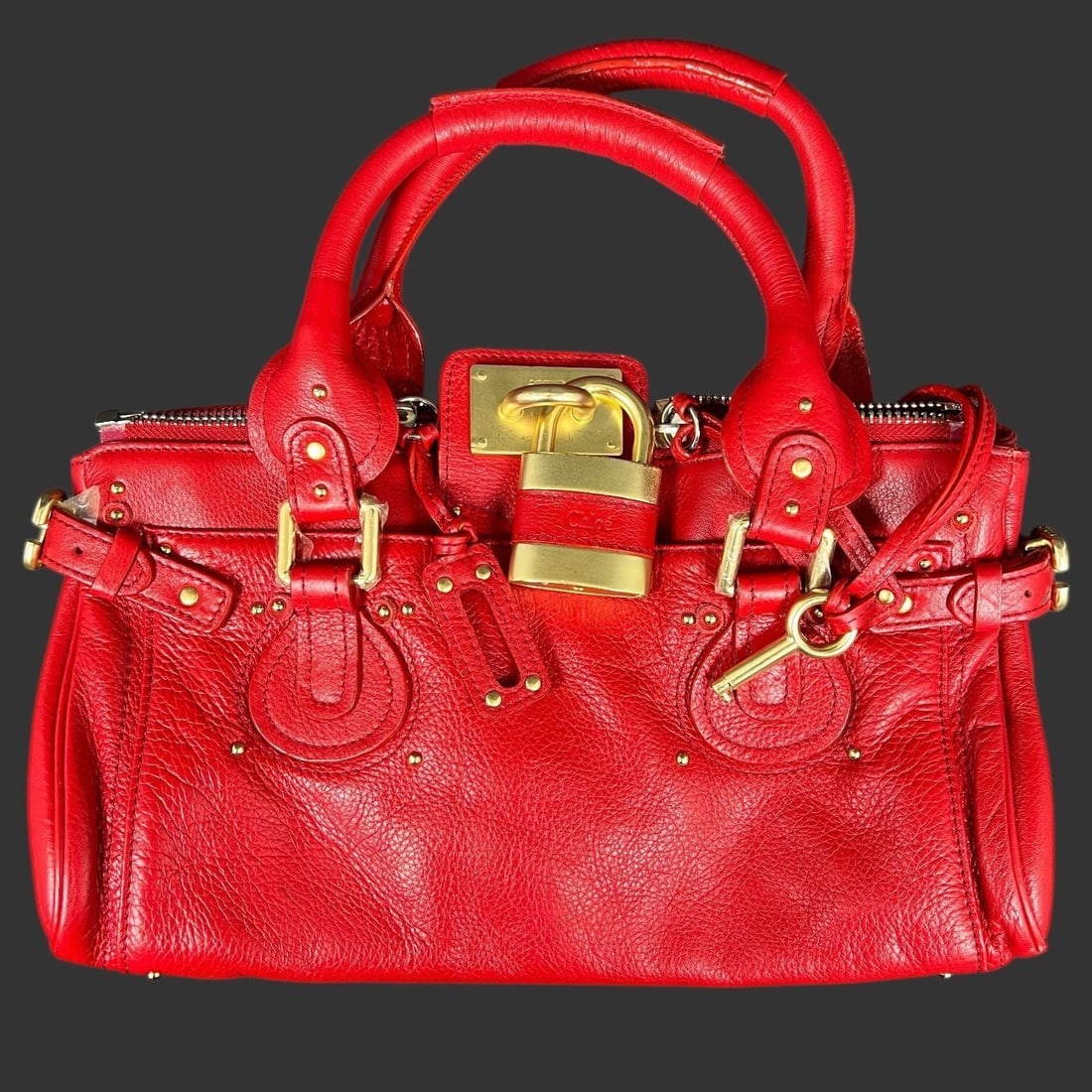 Chloe French Red Leather Handbag Purse: Chloe French Red Leather Handbag Purse. Includes lock and key. Approx. height with handle (in): 14, Approx. width (in): 14.