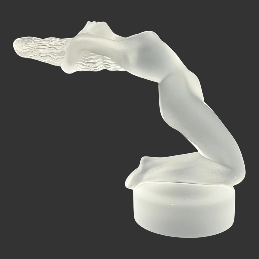 Lalique France "Chrysis" Frosted Glass Figurine: Lalique France "Chrysis" Frosted Glass Figurine. This piece is signed and has the original 'Made in France' label. This iconic sculpture, portraying a kneeling nude female with an arched back and flow