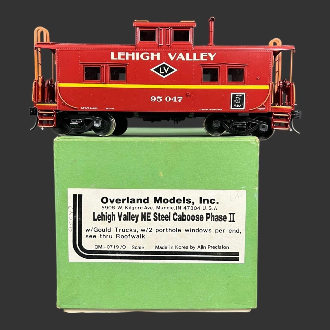 Overland Models LV NE Steel Caboose Phase 2 Train: Overland Models LV NE Steel Caboose Phase 2 Train. 'OMI-0719/ O Scale.' 'W/ Gould Trucks, w/ 2 porthole windows per end, see thru Roofwalk.' This O scale model is a detailed brass reproduction of the