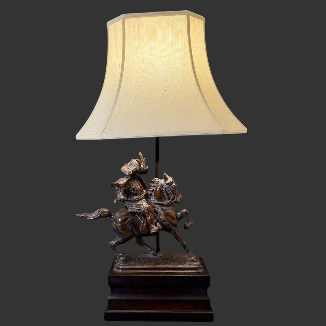 Frederick Cooper Bronze Samurai on Horse Lamp: Frederick Cooper Bronze Samurai on Horse Lamp. Lamp is in working condition. This particular lamp showcases a striking bronze sculpture of a samurai warrior in full armor, charging on horseback, mount