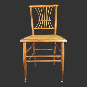 Antique Oak Chair with a Caned Seat & Spindle Back