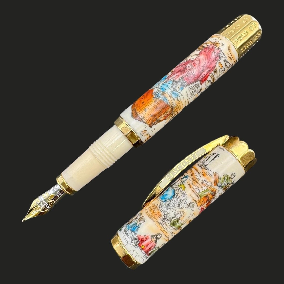 Visconti "La Bibbia" (The Bible) Fountain Pen: This is #063 of a limited run of 999 pieces. The pen features detailed scrimshaw engravings, a technique of drypoint engraving on a pen body that is then filled with ink. The artwork is divided into t