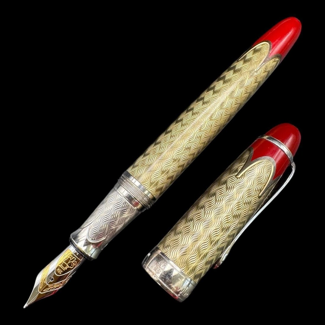 Michel Perchin Park Avenue 18k Nib Fountain Pen: The pen shown is a Michel Perchin Park Avenue Limited Edition Fountain Pen. This pen is part of a series inspired by the neo-Gothic architecture of Park Avenue in New York. It is made of sterling silv
