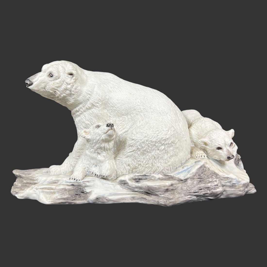 Boehm Polar Bear with Cubs Porcelain Figurine: Boehm Porcelain "Polar Bear with Cubs" sculpture, model number 20114. It depicts a mother polar bear and her two cubs on an ice floe base. Signed on the bottom. Made in England. Approx. dimensions (in