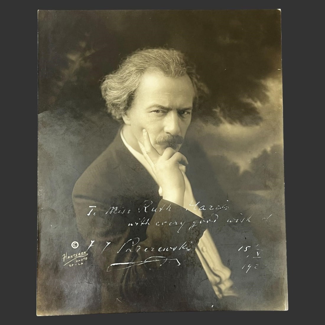 Ignacy Jan Paderewski Signed Portrait Photograph: Presented is an original early 20th-century portrait photograph signed by the renowned Polish pianist, composer, and statesman Ignacy Jan Paderewski. The sepia-toned studio image captures Paderewski i