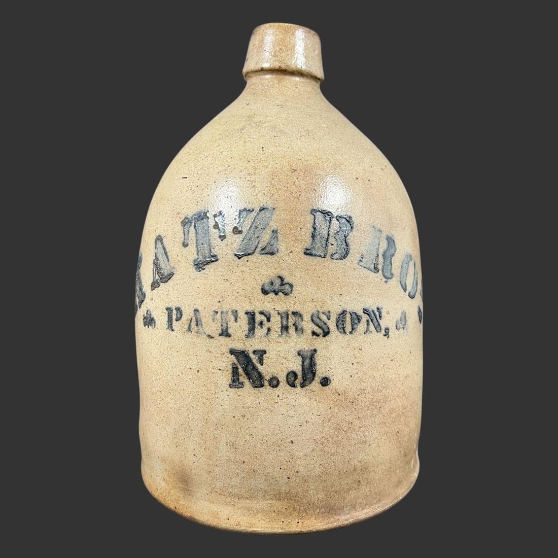 Early American Katz Bros Paterson NJ Stoneware Jug: This is an original late 19th century American salt-glazed stoneware jug boldly stenciled in cobalt blue "KATZ BROS. & PATERSON, N.J." on the front, a scarce and highly collectible merchant's imprint