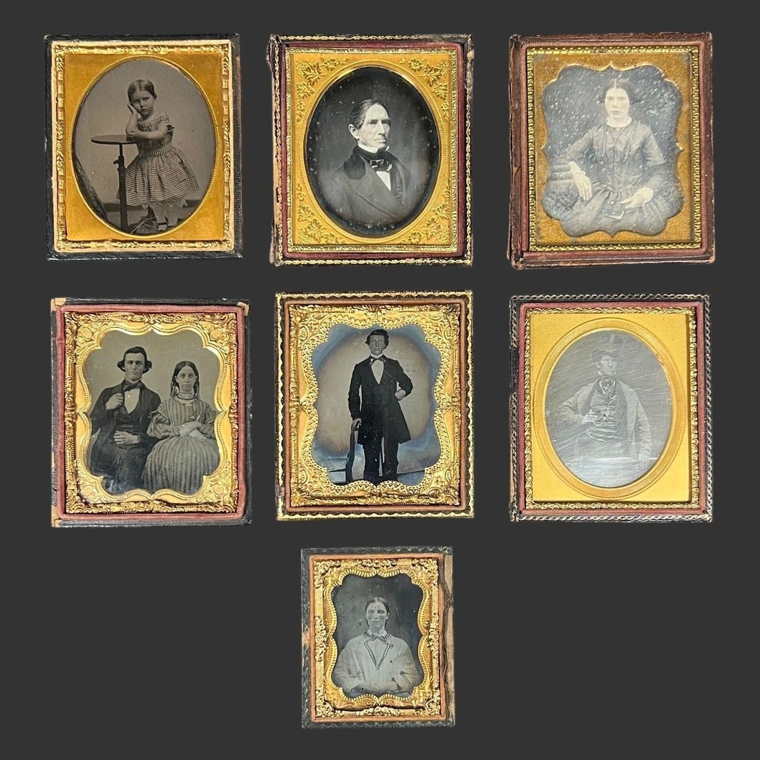 Seven 19th C. Daguerreotypes in Ornate Cases: This attractive lot consists of seven original 19th-century daguerreotypes, each housed in its own period pressed-leather or paper-covered case with gilt brass mats and frames. The group includes a st