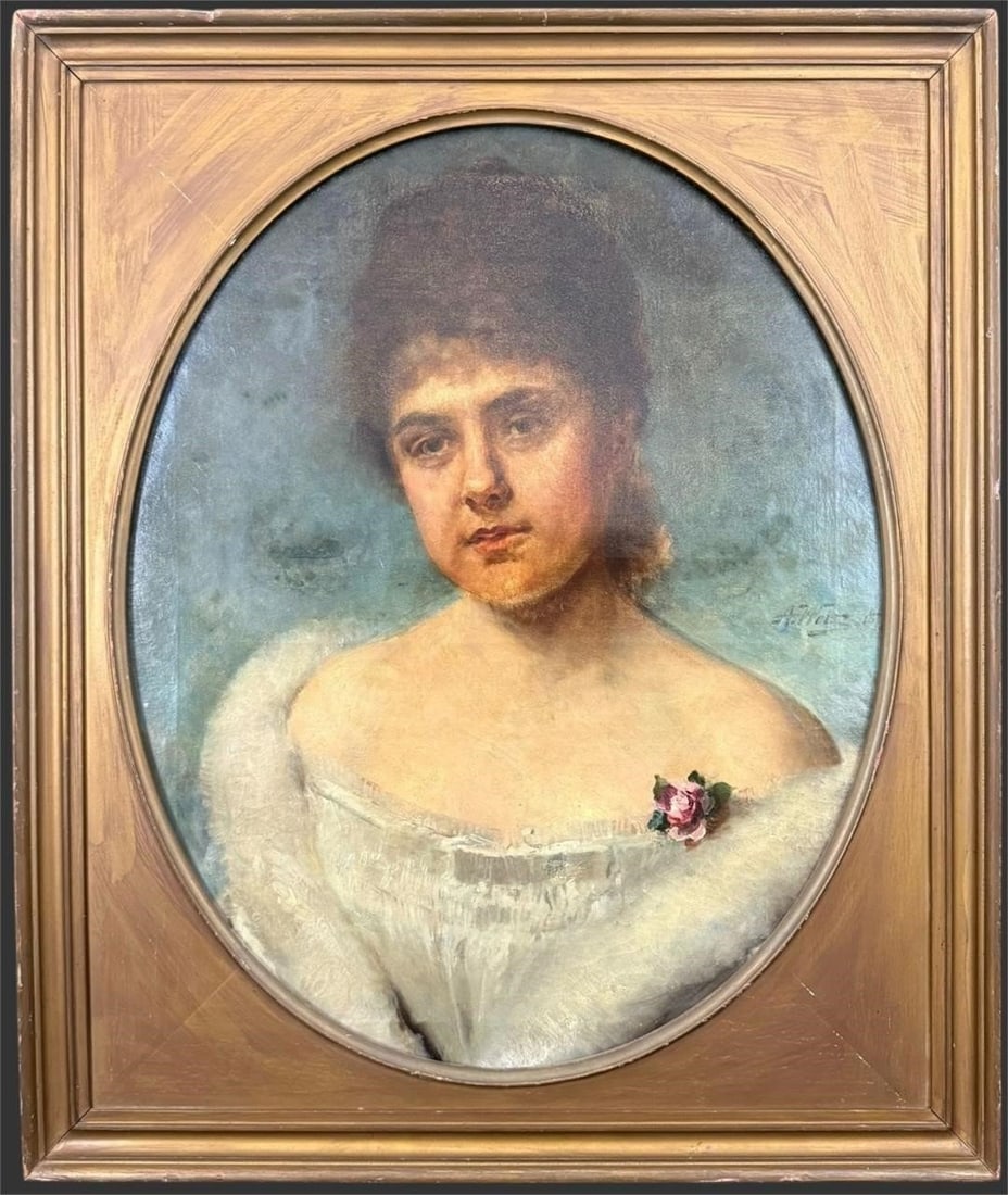 Adolphe Weisz (European, 1838-1900) Painting: This antique oval oil-on-canvas portrait by Adolf Weisz, signed clearly "A. Weisz" at the right, depicts a young woman with dark hair arranged up and a calm, contemplative expression. She is shown wea