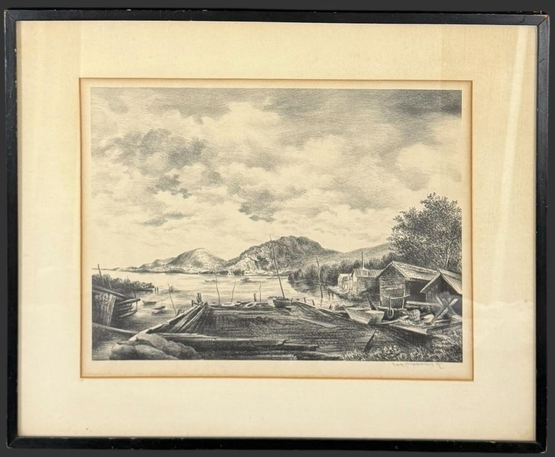 Ira Moskowitz Signed Harbor Landscape Print: This framed black-and-white landscape print by Ira Moskowitz depicts a quiet harbor scene with boats, rustic shoreline structures, and distant hills rendered in fine tonal detail, characteristic of th