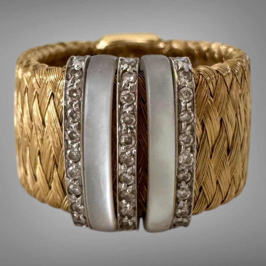 Roberto Coin 18K Mother of Pearl Diamond Ring Band: This beautiful ring features wide, woven yellow gold band accented with two vertical mother of pearl inserts and three rows of pave diamonds. Hidden ruby, fully marked with 18K Italy, and serial numbe
