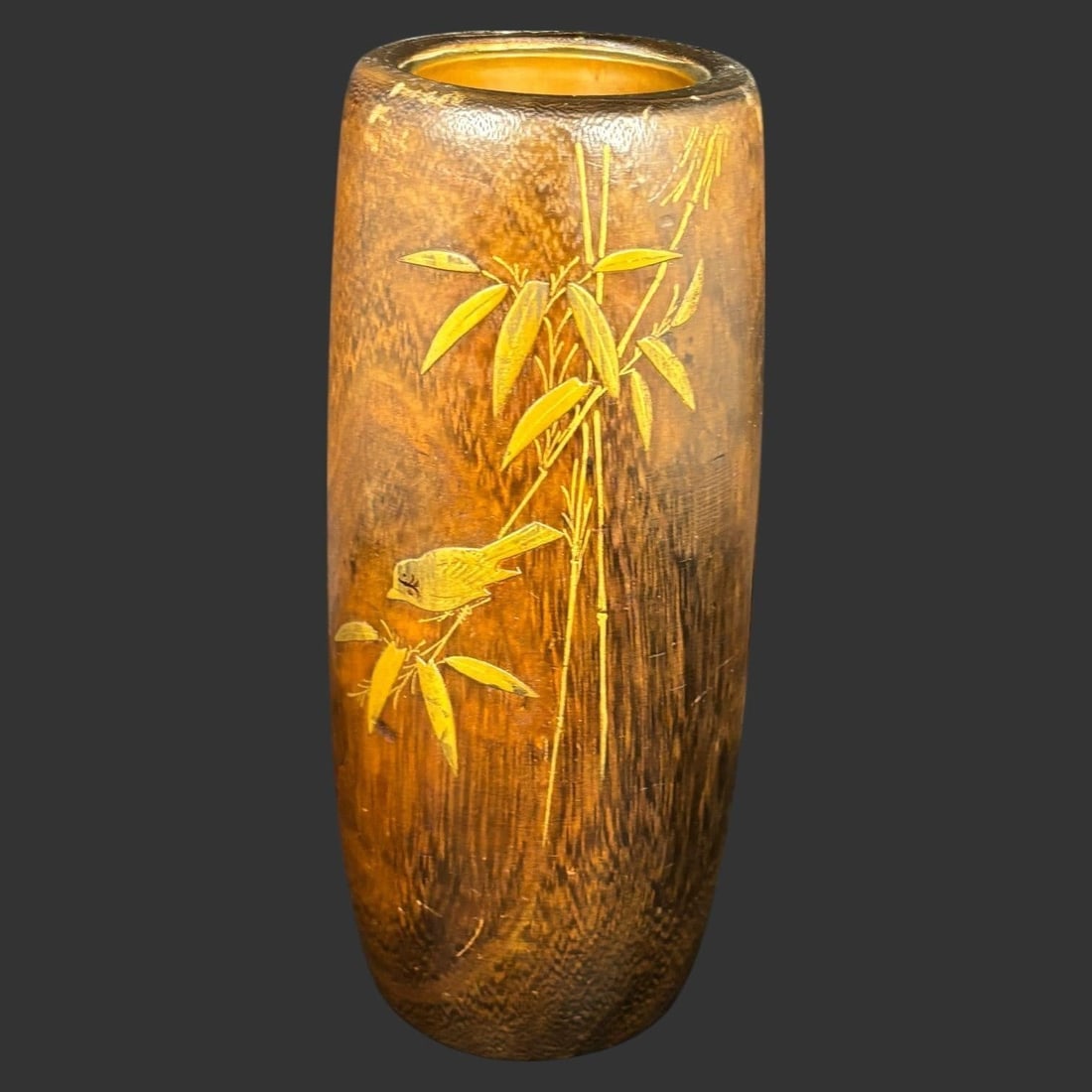 Japanese Bamboo Carved Brush Pot Vase: Decorative carved bamboo brush pot or vase featuring a finely incised scene of bamboo stalks with a small bird perched among the leaves. The cylindrical vessel is carved from a single section of bambo