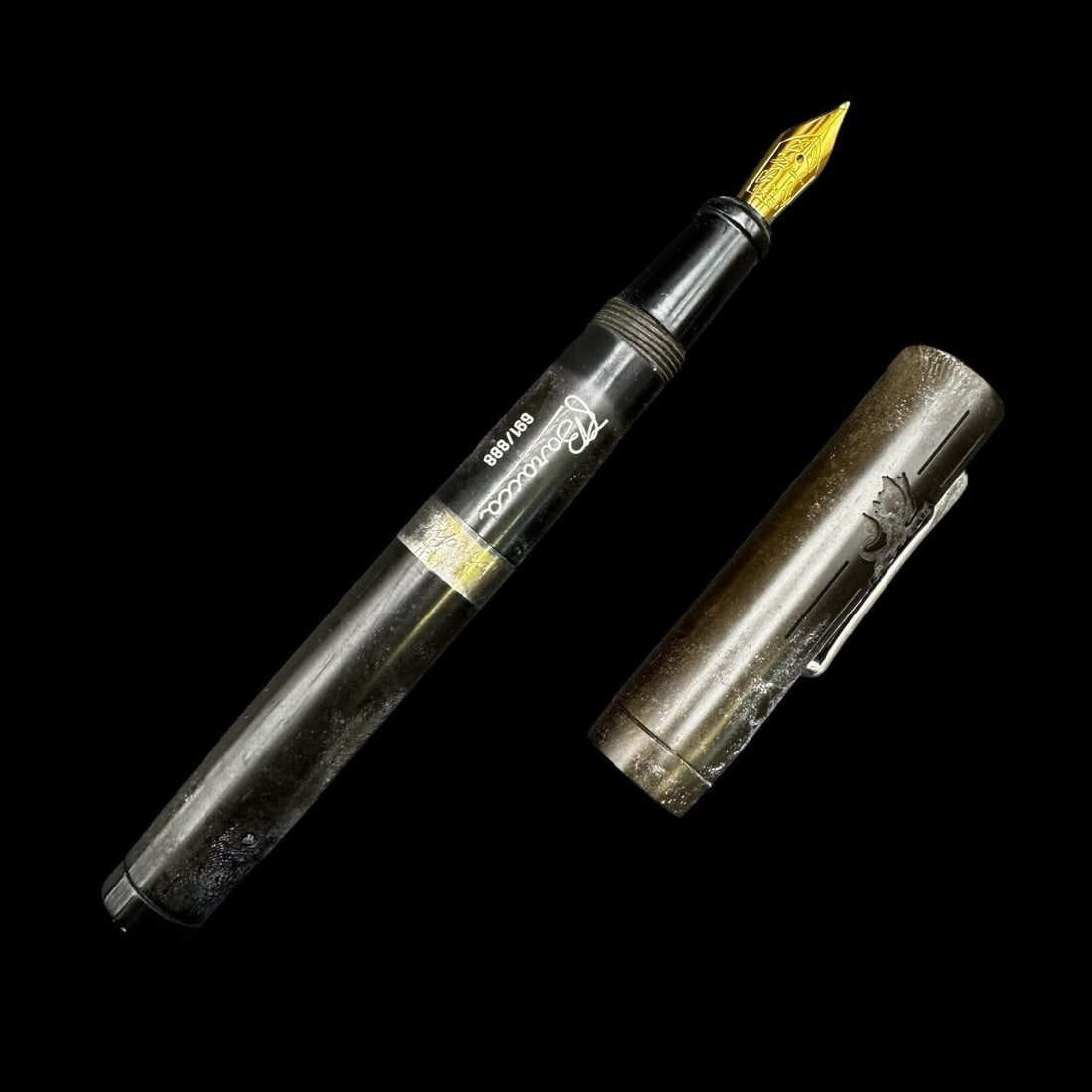 Stipula 'Barracca' 18k Fountain Pen: Stipula "Baracca" limited edition fountain pen, numbered 691/888, featuring a smoky translucent resin barrel and cap with metal trim and clip. The barrel is printed with the Baracca signature and edit