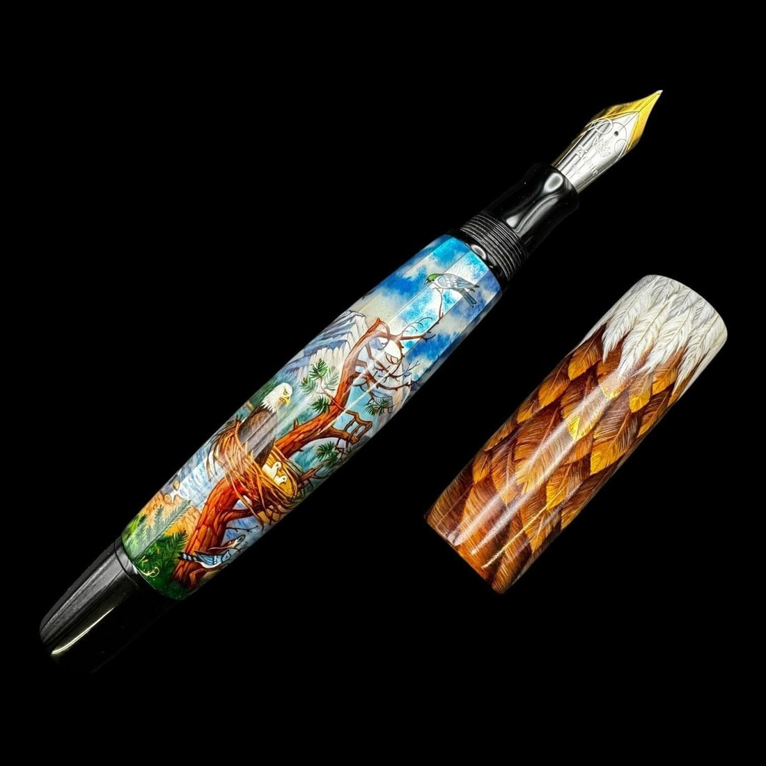 Krone 18k John James Audubon Fountain Pen: Krone "John James Audubon" fountain pen featuring a richly detailed hand-painted wildlife scene inspired by the work of naturalist and artist John James Audubon. The barrel depicts a bald eagle perche