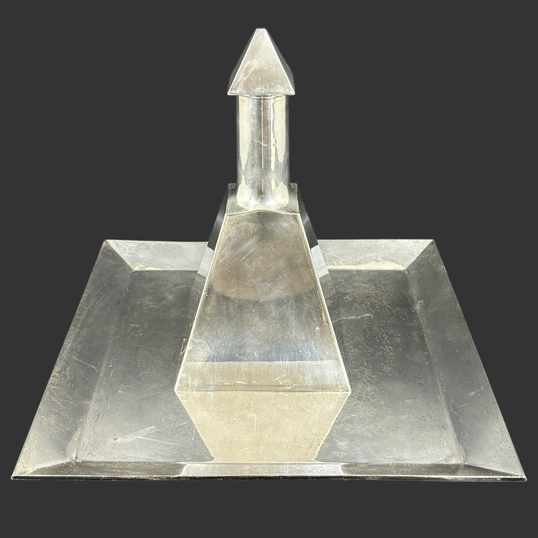 MCM Sterling Silver 925 Geometric Decanter with Matching Tray: A striking vintage sterling silver (.925) decanter accompanied by its original matching tray, both showcasing a bold, modernist geometric design. The decanter features a faceted, architectural body wi