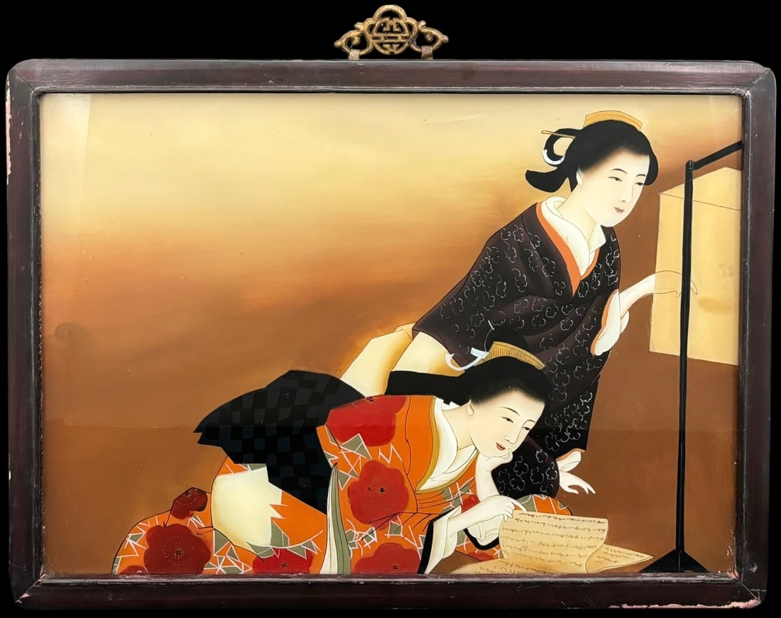 Antique Japanese Reverse-Painted Glass Geisha Scene in Wooden Frame: A decorative antique Japanese-style reverse-painted glass panel depicting two elegantly dressed women in traditional kimono, one reclining while reading a letter and the other standing beside a screen