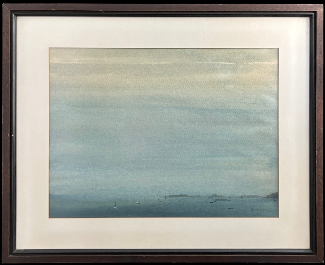 Framed Coastal Harbor Watercolor Painting Signed Boucher: Atmospheric framed watercolor seascape depicting a quiet harbor with small sailboats and distant shoreline under a broad, misty blue-gray sky. The work is signed “Boucher” at the lower rig