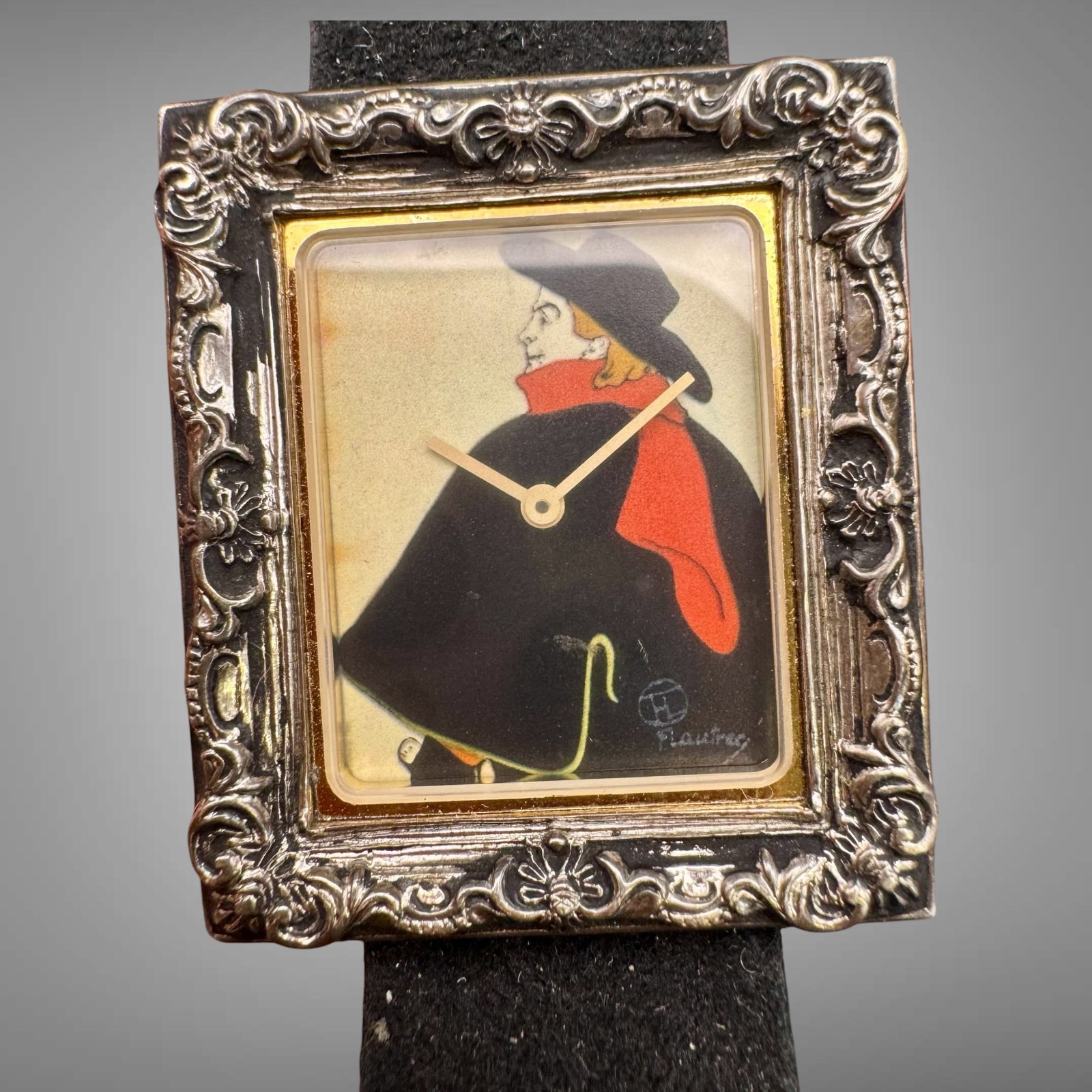Vintage Bulova El Dorado 7500 “Plaire?? Art Dial Wristwatch Ornate Sterling Silver Case: Striking vintage El Dorado 7500 wristwatch featuring a wearable art dial signed “Plaire” with circular monogram. The dial depicts a stylized cloaked figure in black with vivid red scarf,