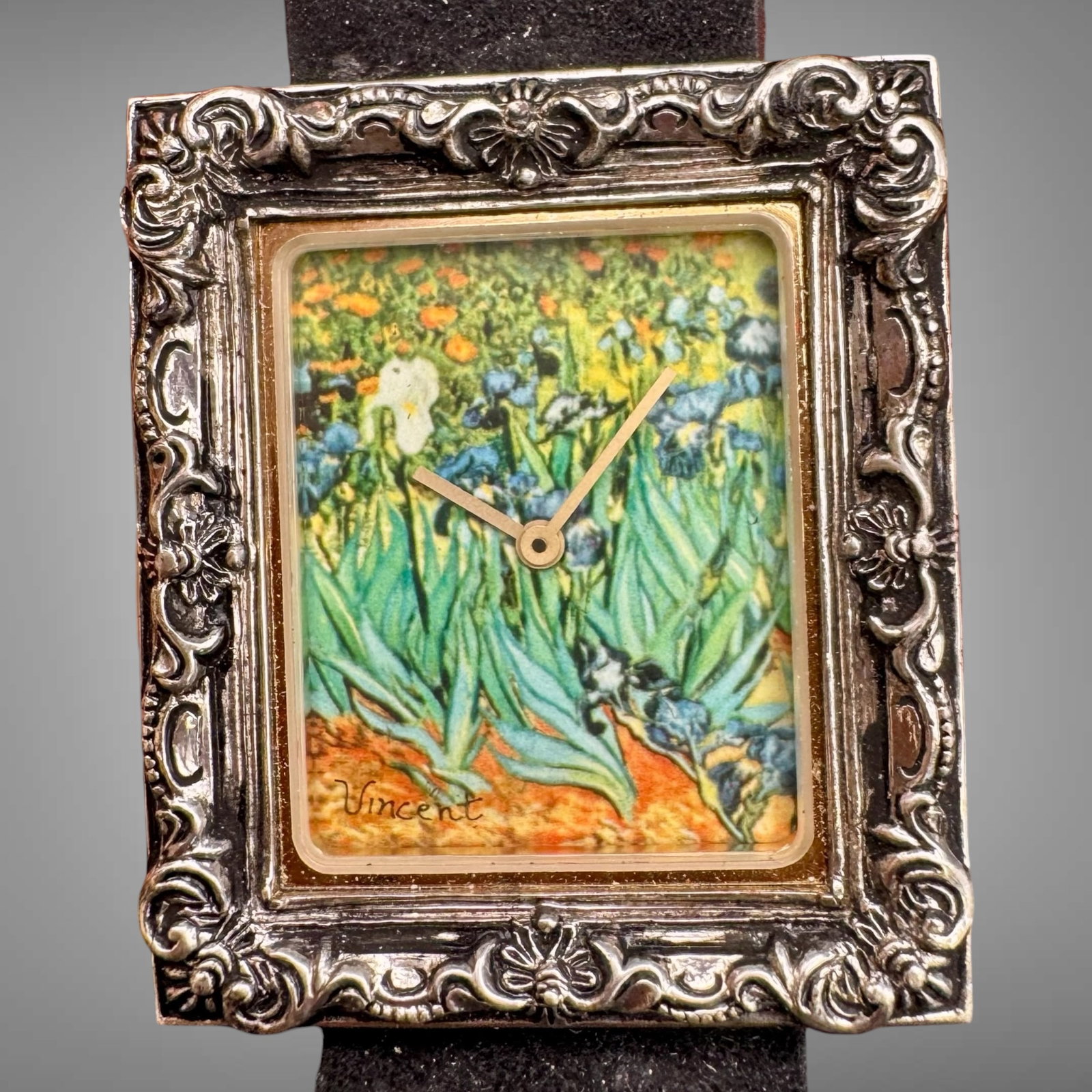 Vintage Bulova Classic Movements “Irises?? Wristwatch Sterling Silver Case Van Gogh Design: Elegant vintage art wristwatch featuring Vincent van Gogh’s famous Irises painting reproduced on the dial with printed “Vincent” signature. This collectible Classic Movements watch c