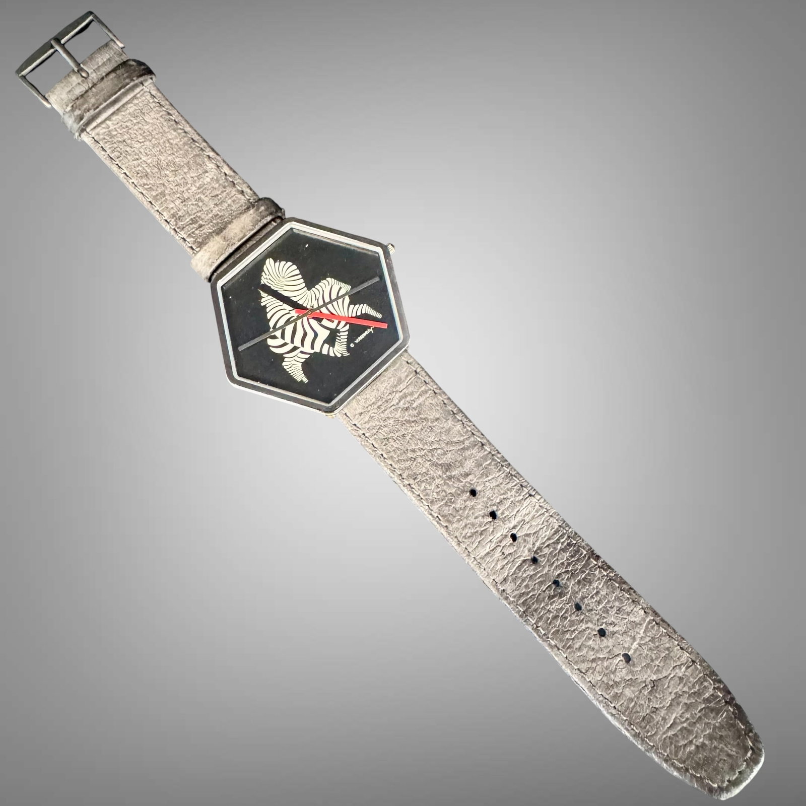 Vintage Bulova “Classic Moments?? Victor Vasarely Art Watch France: Striking vintage Bulova wristwatch from the “Classic Moments” collection featuring licensed artwork by renowned Op Art artist Victor Vasarely. The watch showcases a bold black dial with Va