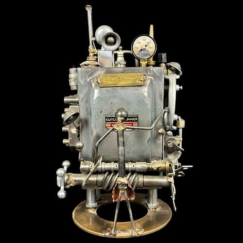 Sonny Dalton (Modern, 1933-2011) Found Object Assemblage Sculpture: Found object assemblage sculpture by Sonny Dalton, constructed from a vintage Cutler-Hammer safety switch housing and an intricate arrangement of repurposed metal components, gauges, levers, tubing, k