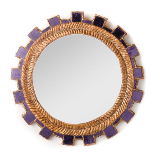 A purple glass and gilt mirror manner of Line Vautrin: A blue glass and gilt mirror having a layered effect in the manner of Line Vautrin. Diameter: 17inch (in)