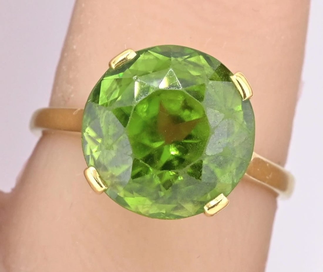 Rare Tiffany & Co 18K Peridot Ring Size 5 IGI Certified: IGI Certified Antique 18K Yellow Gold Peridot Ring | 10.75ct Green Gem | Edwardian/Victorian Era | Size 5This gorgeous antique peridot ring is a true statement piece from the Early to Mid 20th century